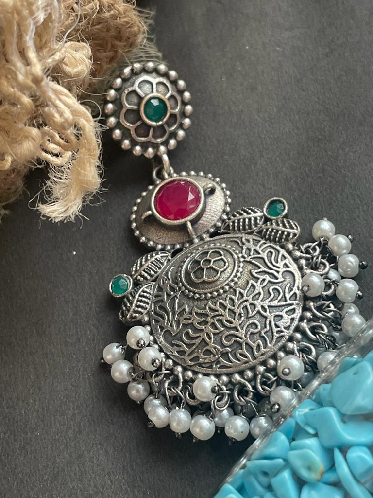Black polish antique look drop earring with stone and beards