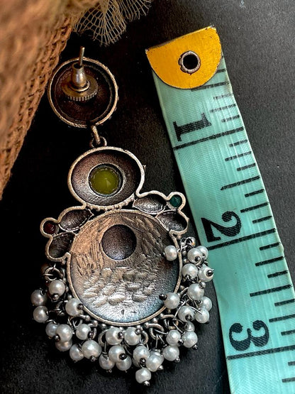 Black polish antique look drop earring with stone and beards