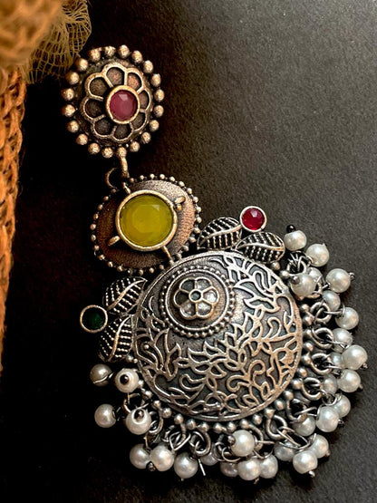 Black polish antique look drop earring with stone and beards