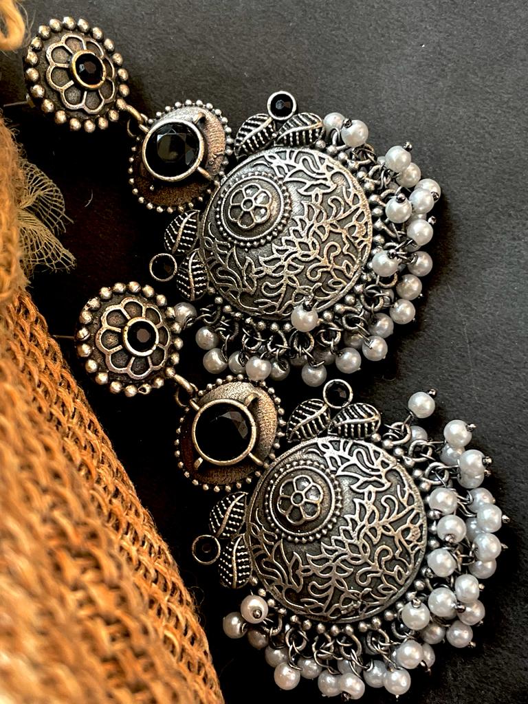 Black polish antique look drop earring with stone and beards