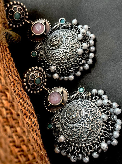 Black polish antique look drop earring with stone and beards
