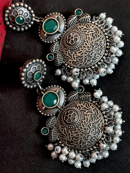 Black polish antique look drop earring with stone and beards