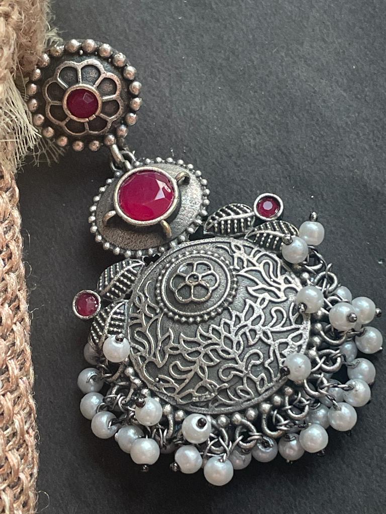 Black polish antique look drop earring with stone and beards